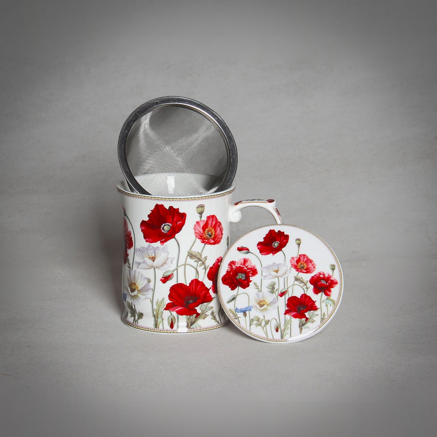 "The Poppy" Tea Infuser with a Lid on the grey background