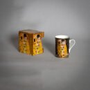 Klimt Kiss mug and gift box on gray background